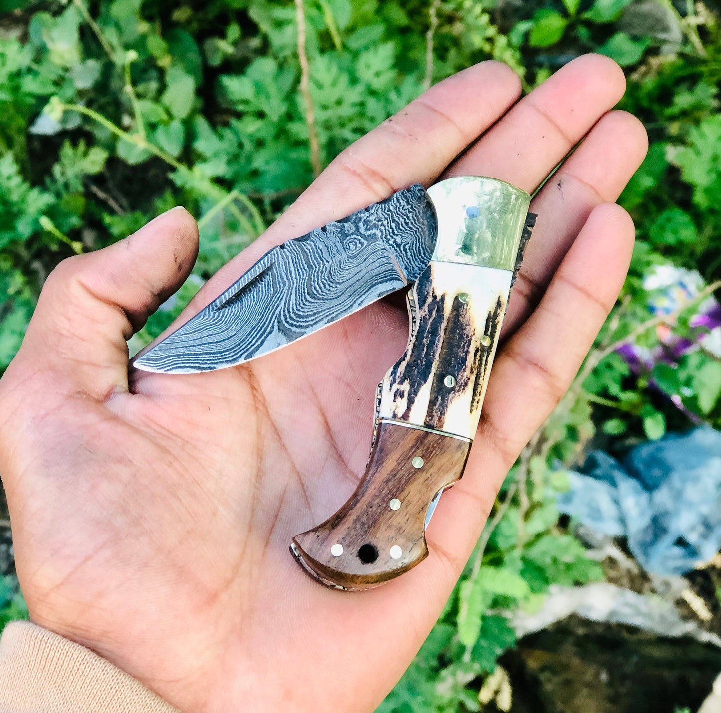 Custom Handmade Damascus Steel Folding Pocket Knife with Rosewood, Antler Horn, and Brass Bolster Handle and Leather Case