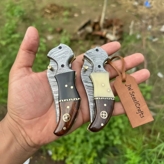 2-Piece Damascus Hawkbill Folding Pocket Knives — Liner Lock, Rosewood Black & Cream Resin Handles, Brass Bolsters