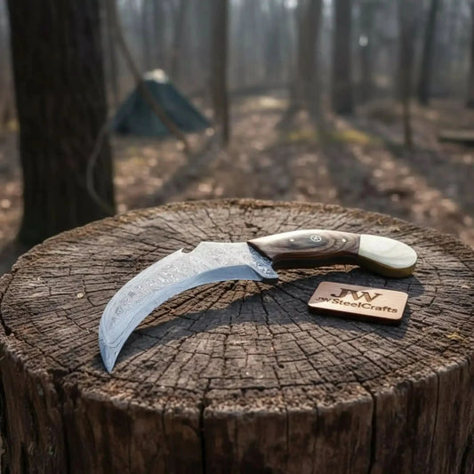 Damascus karambit knife..